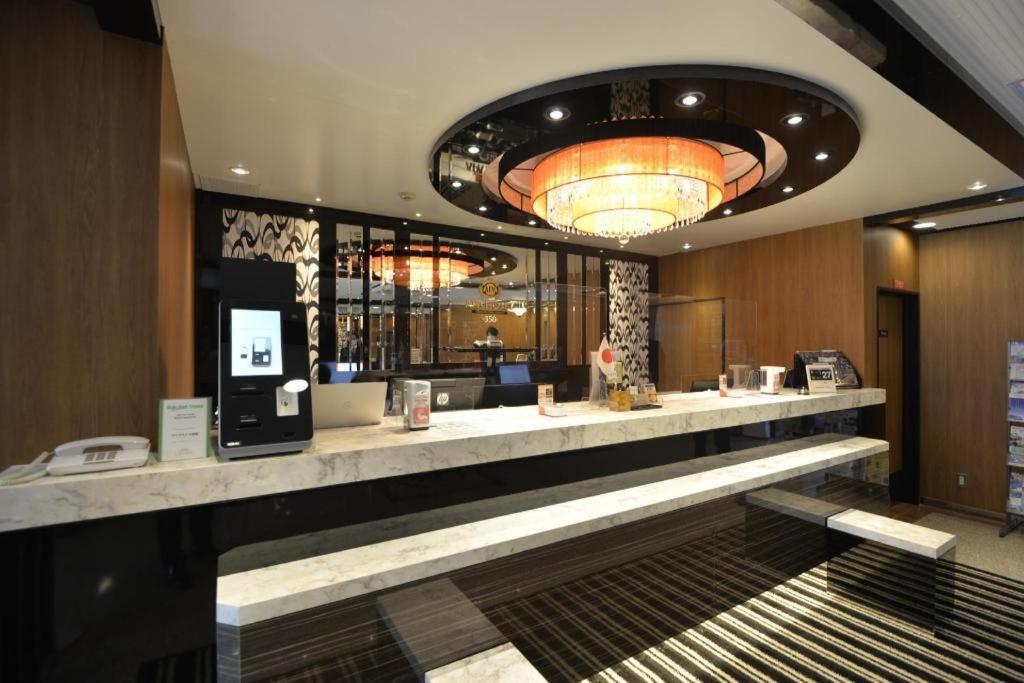 Apa Hotel Nishimaizuruekimae Buitenkant foto