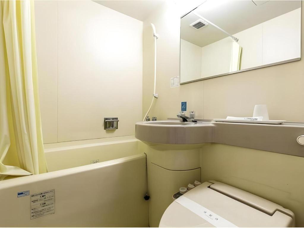 Apa Hotel Nishimaizuruekimae Buitenkant foto